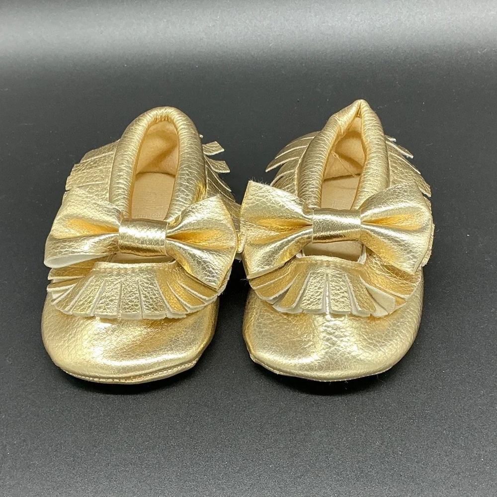 Romirus Metallic Gold Bow Fringe Moccasins